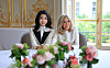 Korean first lady Kim Keon-hee, left, and French first lady Brigitte Macron pose for a commemorative photo at Élysée Palace in Paris on Tuesday. [JOINT PRESS CORPS]