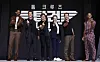 From left, actors Jay Ellis, Miles Teller, Tom Cruise, producer Jerry Bruckheimer, actors Glen Powell and Greg Tarzan Davis treat the press to finger hearts at a press event for their film 'Top Gun: Maverick' at Lotte Hotel World in Jamsil, southern Seoul, on Monday. [NEWS1]