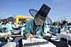 A woman writes in hangul, the Korean alphabet, during a calligraphy competition marking the 578th Hangul Day in Jongno District, central Seoul, on Wednesday. [AP/YONHAP]