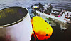 South Korean military forces retrieve a white metal cylinder that the Joint Chiefs of Staff believe was part of the North Korean space launch vehicle that crashed into the Yellow Sea on Wednesday morning. [JOINT CHIEFS OF STAFF]