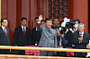 Chinese President Xi Jinping, center, waves next to Premier Li Keqiang and former president Hu Jintao at the end of the event marking the 100th founding anniversary of the Communist Party of China, on Tiananmen Square in Beijing on Thursday. [REUTERS/YONHAP]