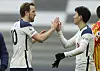 Tottenham Hotspur's Harry Kane and Son Heung-min celebrate after beating West Brom 2-0 at Tottenham Hotspur Stadium in London on Sunday. [REUTERS/YONHAP]