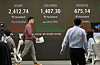 A screen in Hana Bank's trading room in central Seoul shows the Kospi opening on Friday. [YONHAP]