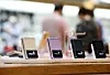Samsung Electronics' foldable Galaxy Z Flip3 is displayed at Samsung's D'light store in Seocho-dong in Gangnam, southern Seoul, on Tuesday. Despite huge demand for newly released smartphones from Samsung Electronics and Apple, a shortage of semiconductors is causing supply delays. Samsung has sold more than 1 million Galaxy Z Fold3 and Flip3 phones since their release in August. [YONHAP]