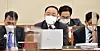 FInance Minister Hong Nam-ki answers questions from lawmakers while attending the National Assembly's Strategy and Finance Committee at the National Assembly in Yeouido, Seoul, on Wednesday. [YONHAP]