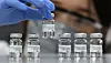 A researcher holds a vial of SKYCovione vaccine, developed and manufactured by SK bioscience [JOINT PRESS CORP]