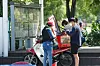 A delivery rider delivers food to a customer in Yeouido, western Seoul, in September. [NEWS1]