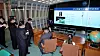 Footage released by the North's state-controlled Korean Central Television shows leader Kim Jong-un pointing toward a screen display of the regime's planned reconnaissance satellite. [YONHAP]