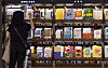 A consumer browses bestsellers at Kyobo Bookstore’s Gwanghwamun branch in Jongno District, central Seoul, on April 22.[YONHAP]