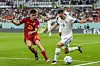 Spain's Pedri, left, vies for the ball with Costa Rica's Bryan Oviedo, right, during the World Cup group E football match between Spain and Costa Rica, at the Al Thumama Stadium in Doha, Qatar, on Wednesday. [AP/YONHAP]