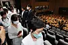 Nurses leave the National Assembly in disappointment after the Nursing Act, which had been vetoed by President Yoon Suk Yeol earlier, failed to secure the necessary two-thirds support from legislators to be enacted on Tuesday. Nurses had argued for the need to allow them to provide independent medical services, especially to older adults. Doctors strongly opposed the legislation, however, warning that it would lead to unsupervised medical practices by nurses. Other medical professionals including nursing assistants expressed concern that their jobs would be lost if the Nursing Act went into effect. [YONHAP]