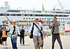Chinese group tourists disembark from the Blue Dream Melody, the first cruise ship to come to Busan from China in the six years since 2018, at Busan Port's International Passenger Terminal on Wednesday. [YONHAP]