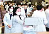 Medical professors of Korea University submit their resignations at a general assembly at its Anam Hospital in central Seoul on Monday morning. [YONHAP]