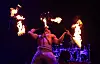 Performer Falaniko Solomona Penesa does the 'Fire Knife Dance' during a press preview of Cirque du Soleil's 'Alegria in a New Light' at Jamsil Sports Complex’s Big Top Theater in Songpa District, southern Seoul, on Thursday. [YONHAP]