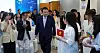 President Yoon Suk Yeol, center, and first lady Kim Keon-hee meet with Vietnamese students at an event promoting Korean language at Vietnam National University in Hanoi Thursday as he kicked off a three-day state visit to Vietnam. [JOINT PRESS CORPS]