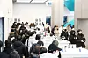Visitors at Gangnam Samsung activate their Galaxy S25 smartphones. [SAMSUNG ELECTRONICS]