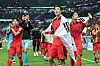 Cho Gue-sung, center, wraps the Korean national flag around his back after a match against Portugal during the Qatar World Cup on Dec.2. [NEWS1]