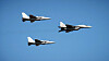 The first of two Korean FA-50 light fighter aircraft delivered to Poland fly above Warsaw in formation behind a MiG-29 fighter on Tuesday during a military parade in Warsaw to celebrate the country's Armed Forces Day. [KOREA AEROSPACE INDUSTRIES]