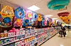 A shopper looks at swimming tubes displayed at a discount mart in Seoul. Retailers have begun to display a variety of summer gear ahead of the summer vacation season. [YONHAP]