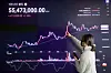 A display at Upbit, a cryptocurrency exchange in Gangnam District, southern Seoul, shows the price of bitcoin surpassing 50 million won ($45,200) on Wednesday for the first time in history. [NEWS1]
