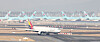 Korean Air and Aisana planes at Incheon International Airport on Tuesday. [YONHAP]