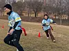 Mary chases her partner around the cones in a drill akin to a familiar children's game. But this is no child's play. [GENF]