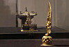 Two national treasures - the Portable Shrine of Gilt-bronze Buddha Triad, left, and the Gilt-bronze Standing Buddha Triad with Inscription of 'Gyemi Year,' are on display at K Auction in southern Seoul on Monday for a limited time for local reporters. The auction will take place on Jan. 27. [YONHAP]