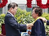 President Moon Jae-in, left, awards a Moran Medal to Bae Eun-shim, mother of the late student activist Lee Han-yeol, during the June 10 Democratic Protest anniversary ceremony on Wednesday.  [YONHAP]