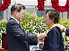 President Moon Jae-in, left, awards a Moran Medal to Bae Eun-shim, mother of the late student activist Lee Han-yeol, during the June 10 Democratic Protest anniversary ceremony on Wednesday. [YONHAP]