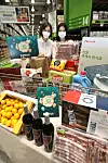 Models pose behind items on sale to celebrate the 10th anniversary of Emart's big-box warehouse chain, Emart Traders, on Monday at the store's Nowon branch in northern Seoul. Items will be available at up to 50 percent off until Nov. 1. [EMART]