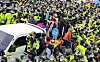 Police troops stop protesters who try to block military vehicles from entering the U.S. Forces Korea's Terminal High Altitude Area Defense (Thaad) base in Seongju, North Gyeongsang. [NEWS1]