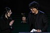 Sharon Choi, left, and director Bong Joon-ho [AP/REUTERS]