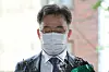 Kim Man-bae, owner of Hwacheon Daeyu - a company suspected of receiving political favors and reaping outsized profits from a development project in Seongnam, Gyeonggi through an alleged connection with Gyeonggi Governor Lee Jae-myung -- reports to the Yongsan Police Precinct in central Seoul for questioning on Monday. [NEWS1]