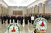 North Korean leader Kim Jong-un, third from left in front row, and his top cadre, including his younger sister Kim Yo-jong, second from left, on Thursday pay tribute to their father and former leader Kim Jong-il on the ninth anniversary of his death, as shown in a photograph from state media. The ceremony took place at the Kumsusan Palace of the Sun, where Kim Jong-il and his father Kim Il Sung's bodies are laid in state. [YONHAP]