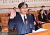 Oh Dong-woon, a former judge nominated as the chief of the Corruption Investigation Office for High-ranking Officials, takes an oath at the start of his confirmation hearing at the National Assembly in western Seoul on Friday. [YONHAP]
