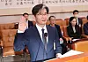 Oh Dong-woon, a former judge nominated as the chief of the Corruption Investigation Office for High-ranking Officials, takes an oath at the start of his confirmation hearing at the National Assembly in western Seoul on Friday. [YONHAP]