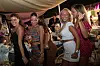 Women dance at an outdoor restaurant on a beach in Fregene near Rome, on Aug. 14. While the threat of a second wave of coronavirus looms in several European countries, Italy is trying to stem new infections in the middle of the Ferragosto holiday weekend of Aug. 15. [AFP/YONHAP]