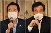 Prime Minister Chung Se-kyun, left, and ruling party leader Lee Nak-yon speak during a meeting held Sunday. [YONHAP]