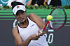 Jeong Bo-young returns a shot to Jelena Ostapenko of Latvia during the first round of the Korea Open at the Olympic Park Tennis Center in Songpa District, southern Seoul on Tuesday. [AP/YONHAP]