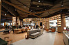 Book Ground, a smaller version of the Starfield Library seen on the larger Starfield shopping complex branch in Coex and Suwon, located at the center of the Starfield Market Emart Jukjeon in Yongin, Gyeonggi. The Book Ground is accompanied by a Starbucks cafe — the largest Starbucks inside any Emart branch — followed by a spacious open seating area surrounding it. [CHO YONG-JUN]