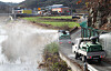 Quarantine vehicles disinfect Samdong District in Ulju, Ulsan, on Nov. 21, 2022, after a highly pathogenic strain of H5N1 of avian influenza was found from wild birds' excrement collected near the area. [YONHAP]
