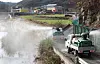 Quarantine vehicles disinfect Samdong District in Ulju, Ulsan, on Nov. 21, 2022, after a highly pathogenic strain of H5N1 of avian influenza was found from wild birds' excrement collected near the area. [YONHAP]