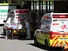 A Covid-19 patient is transported by emergency workers from an affected hospital in Gunpo, Gyeonggi, to another care center on Thursday. [YONHAP]