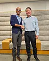 SK Chairman Chey Tae-won, right, with Microsoft CEO Satya Nadella [SCREEN CAPTURE]