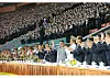 North Korean leader Kim Jong-un, center, waves at mass games organized on Sunday to commemorate the ruling Workers' Party's 75th anniversary. [NEWS1]