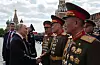 Russian President Vladimir Putin, left, greets North Korean army generals after a military parade on Victory Day marking the 80th anniversary of the victory over Nazi Germany in World War II, in Red Square in central Moscow May 9. [SPUTNIK/YONHAP]