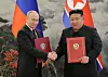 North Korean leader Kim Jong-un, left, and Russian President Vladimir Putin sign a ″comprehensive strategic partnership″ on June 20, 2024, [NEWS1]