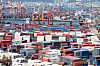 Shipping containers are stacked up at a port in Busan on Aug. 1 [JOONGANG PHOTO]