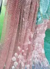 Dozens of jellyfish are caught by a fishing net which was pulled from the waters off Gochang County in North Jeolla last Wednesday. [YONHAP]