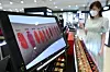 A cosmetics shop at Lotte Department Store in central Seoul in July [YONHAP]